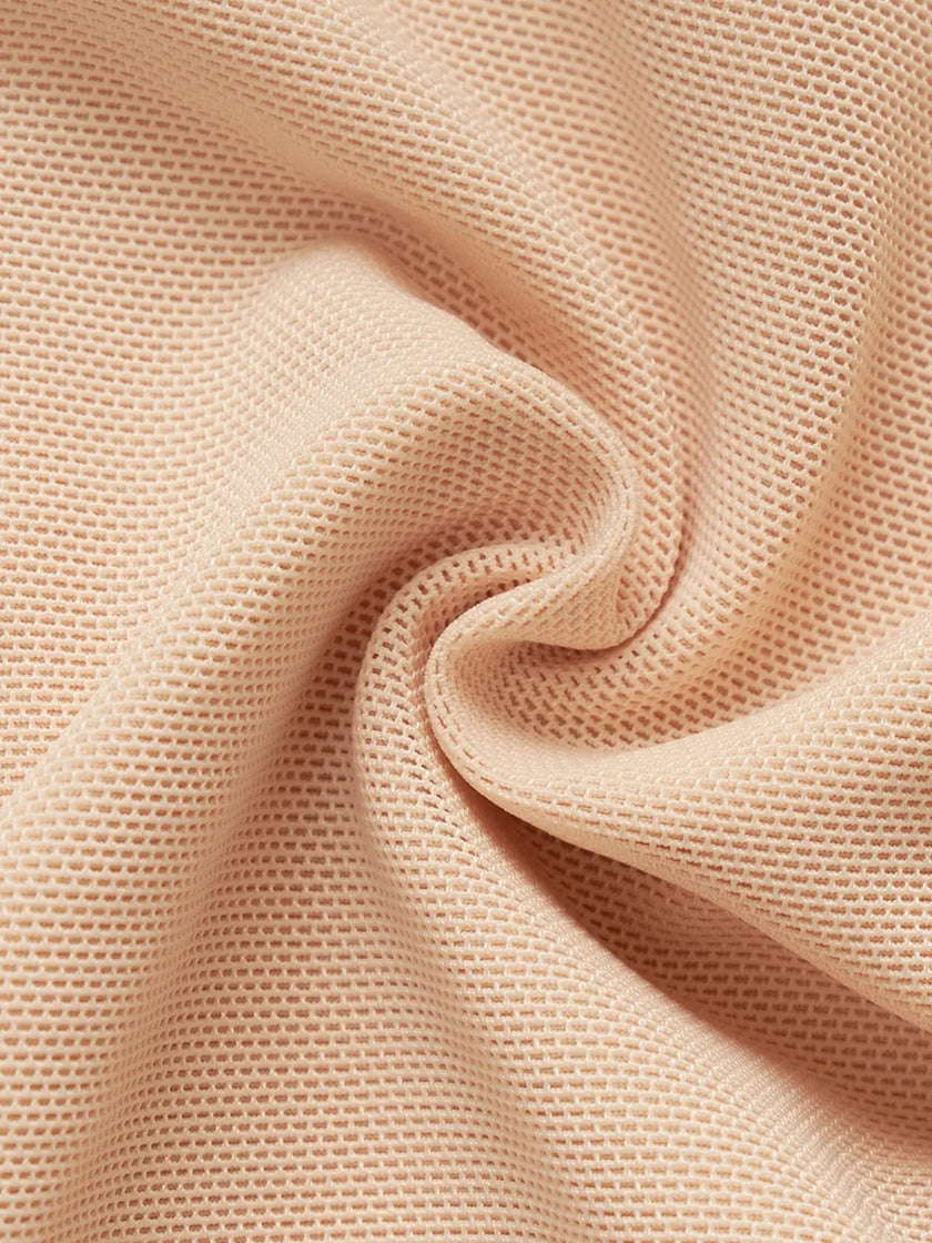 Smooth black fabric of body shaper with elasticized waist