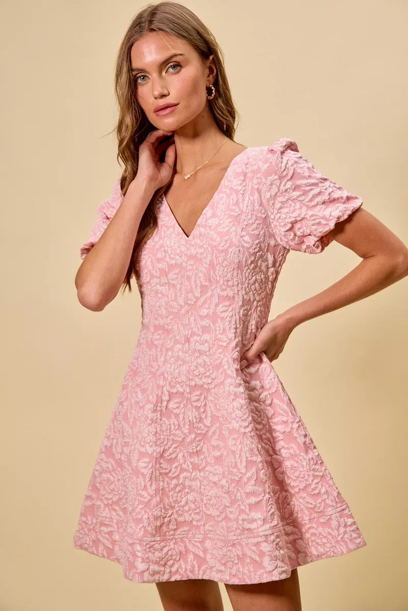 Floral jacquard mini dress featuring V-neckline and short sleeves