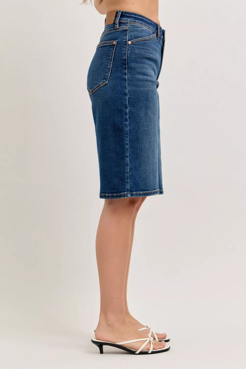 Blue high waist denim shorts with pockets and stretchy cotton blend texture