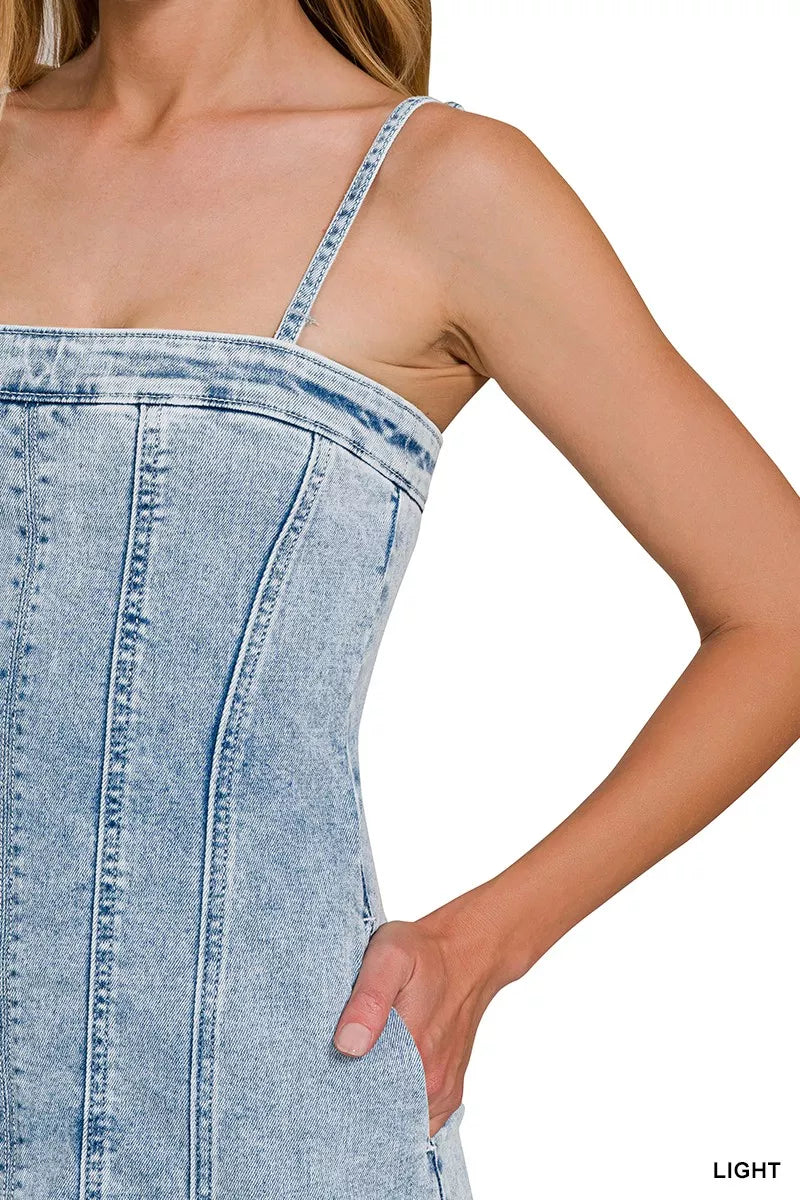 Light-wash denim dress with spaghetti straps and exposed seam detailing