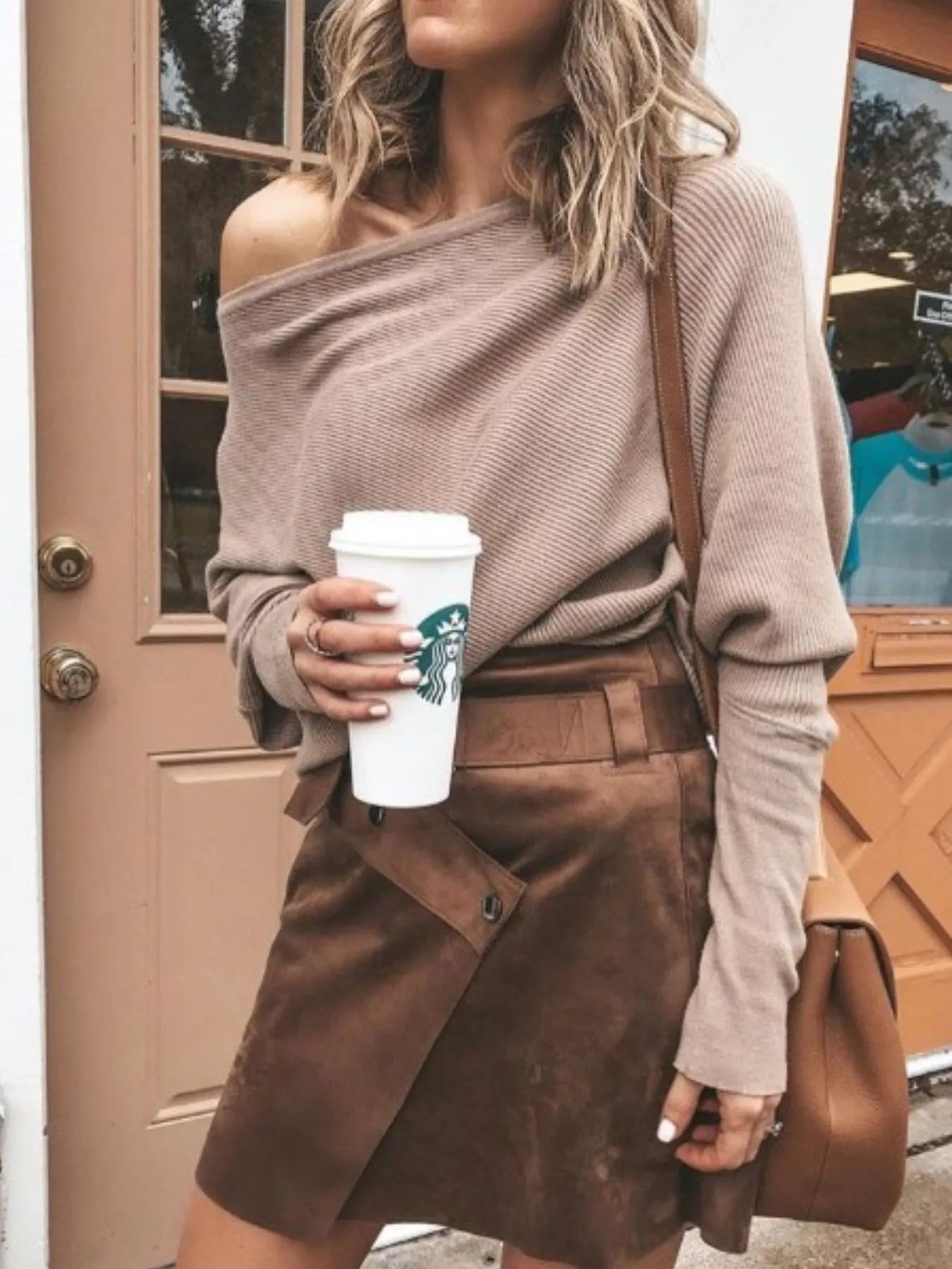 Soft ribbed knit top featuring off-shoulder neckline and relaxed silhouette