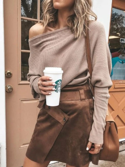 Soft ribbed knit top featuring off-shoulder neckline and relaxed silhouette