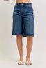 Blue high-waisted denim Bermuda shorts with stretchy cotton blend texture and front pockets
