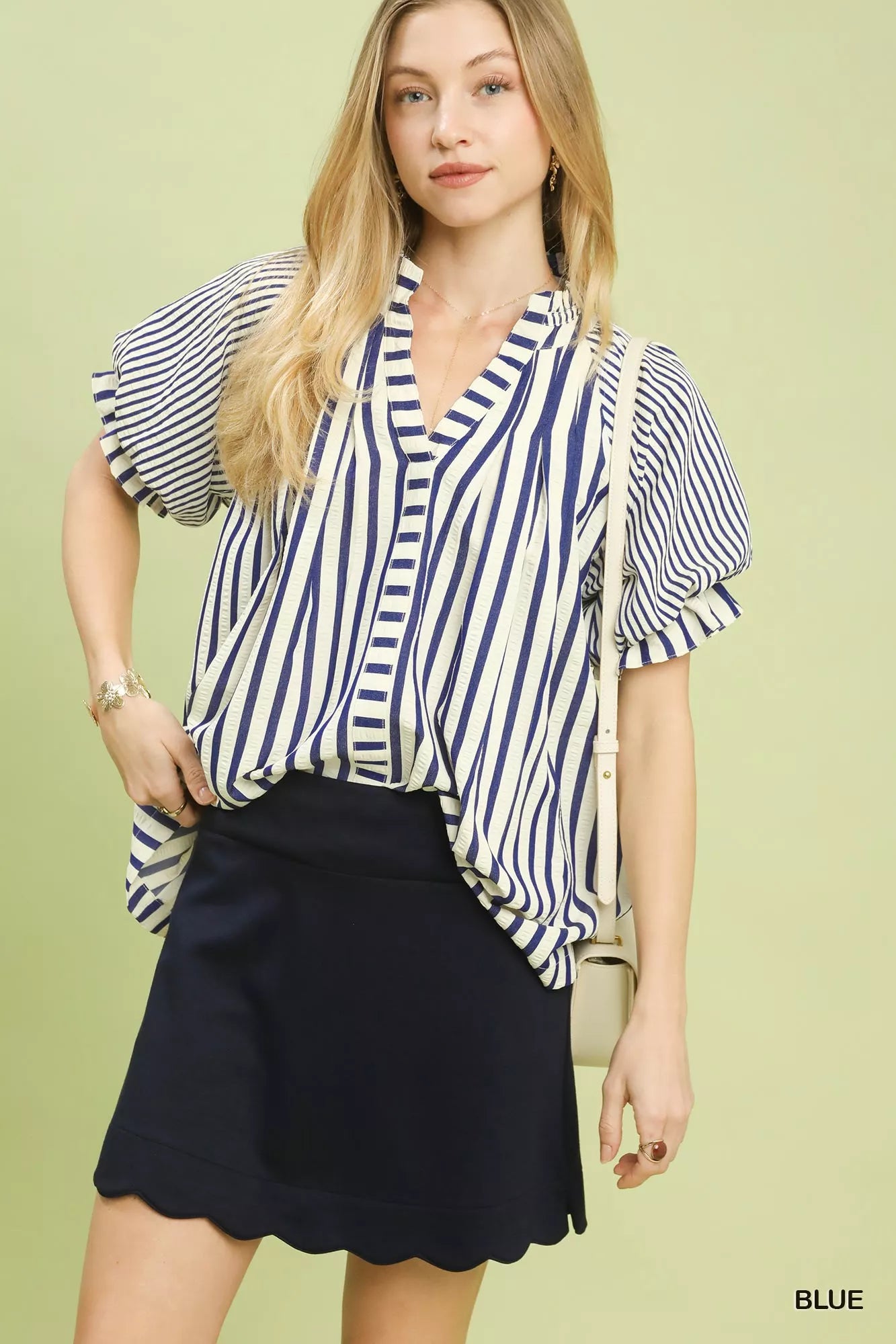 Striped top with notched neckline and flutter sleeves