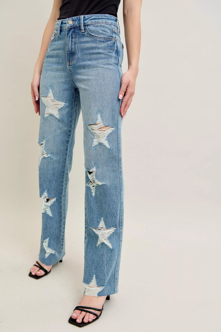 High-waisted rigid denim jeans with distressed star cutouts, plus fit, 90s style, rigid magic wash