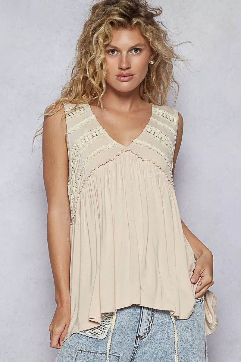 Close-up of lace-trimmed babydoll top showing soft ruffle texture