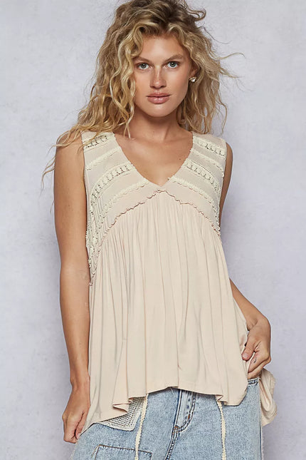 Close-up of lace-trimmed babydoll top showing soft ruffle texture