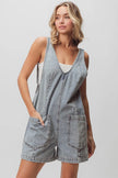 Light-washed denim shortall with patch pockets and relaxed fit